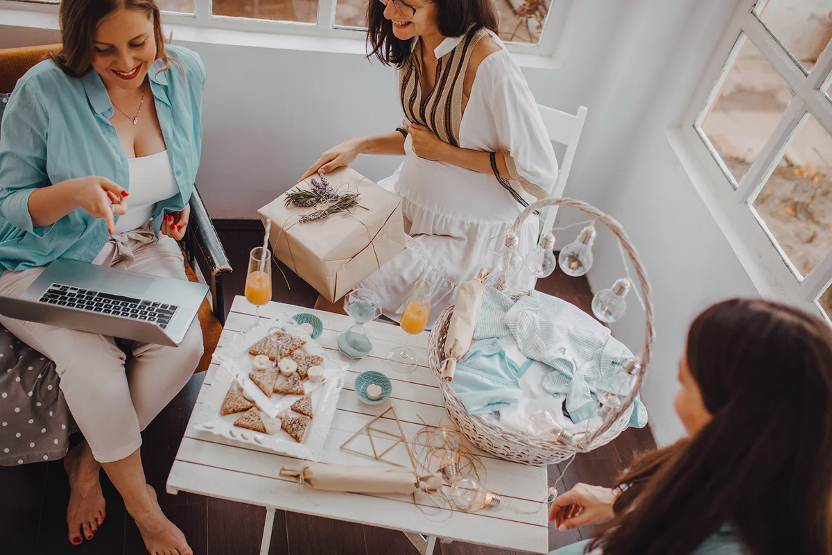 Pregnant woman with her female friends