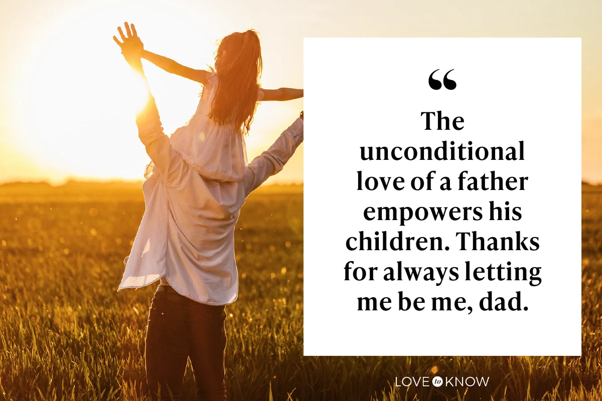 Little girl on her fathers shoulders in fields