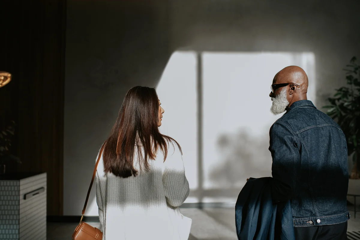 man and woman walking