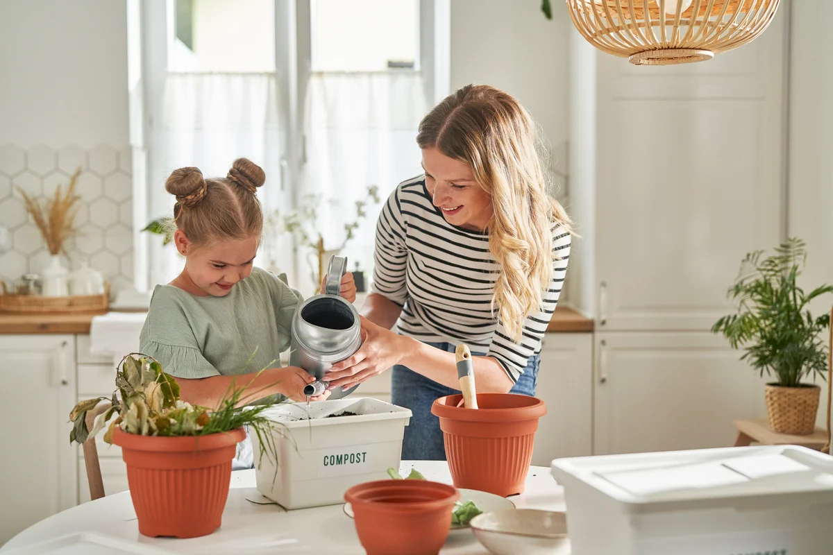 mother and daughter composting
