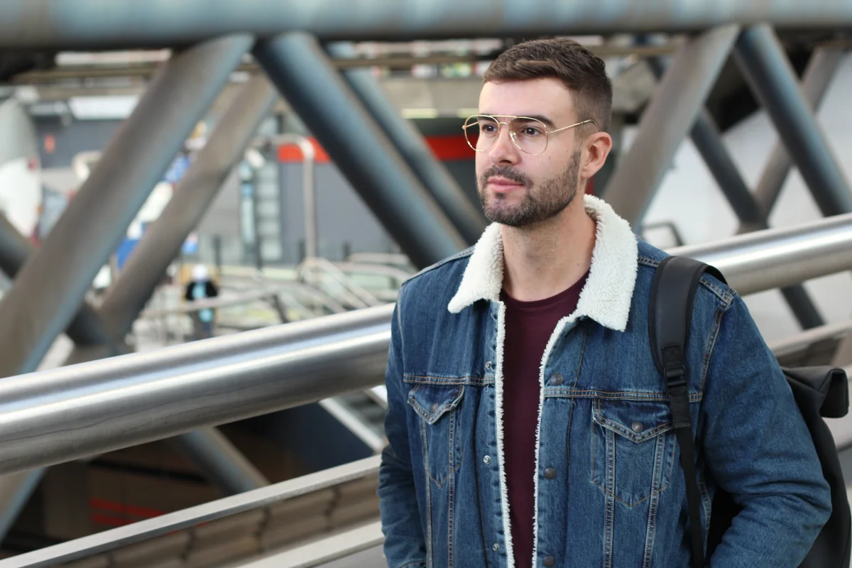 90s guy walking pensive