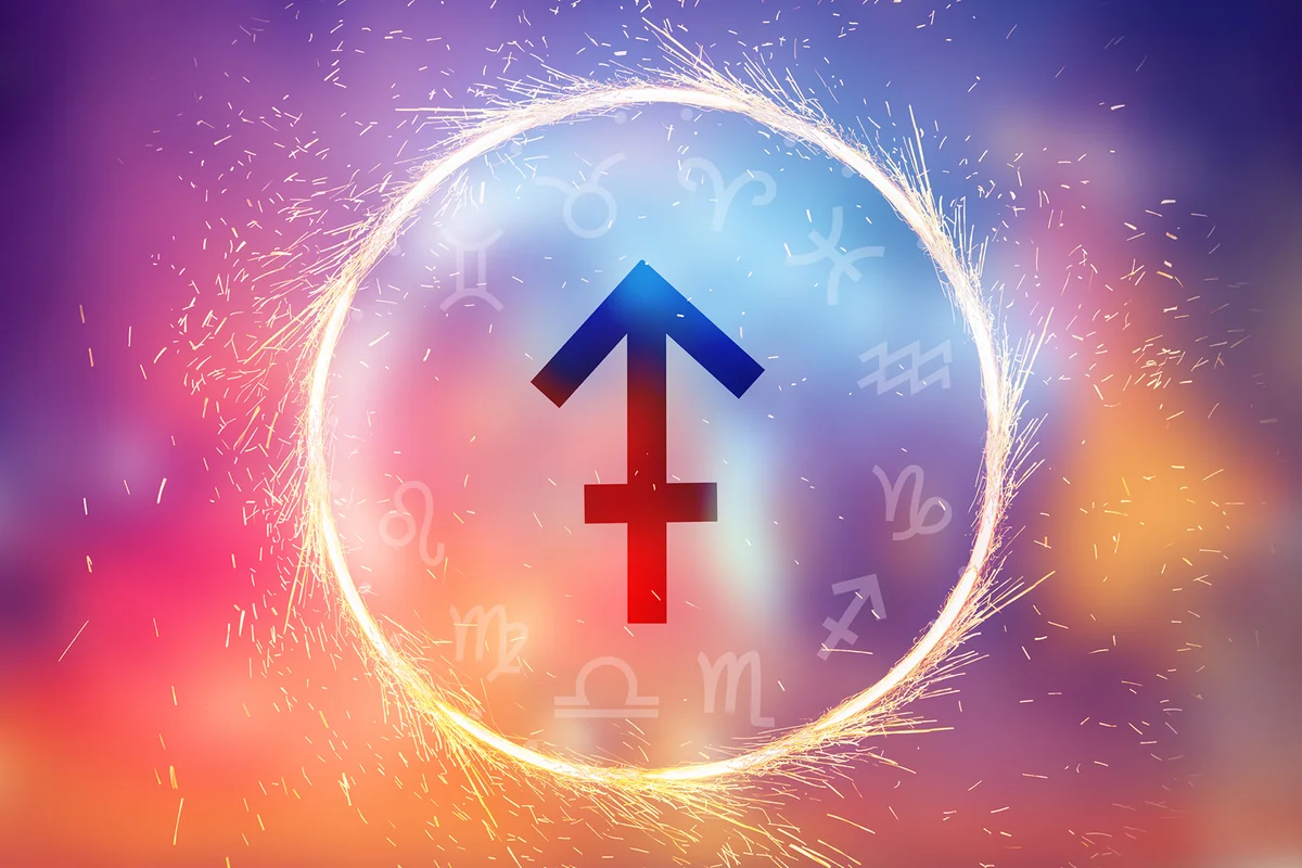 Sagittarius symbol on a colorful background light