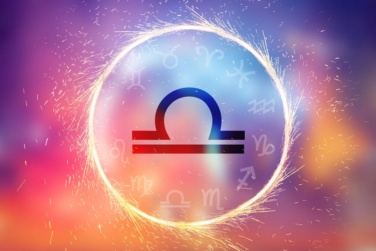 Libra symbol on a colorful background light