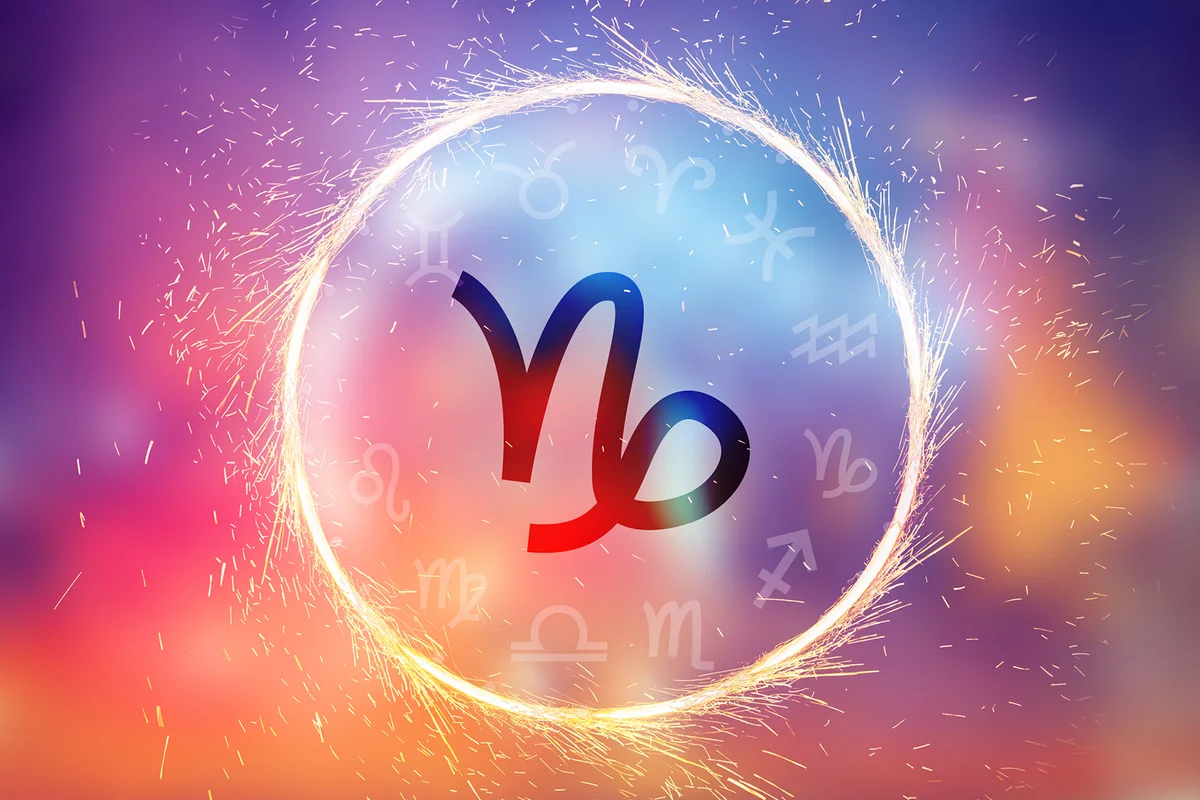 Capricorn symbol on a colorful background light