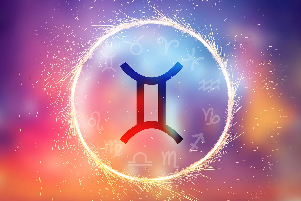 Gemini symbol on a colorful background light