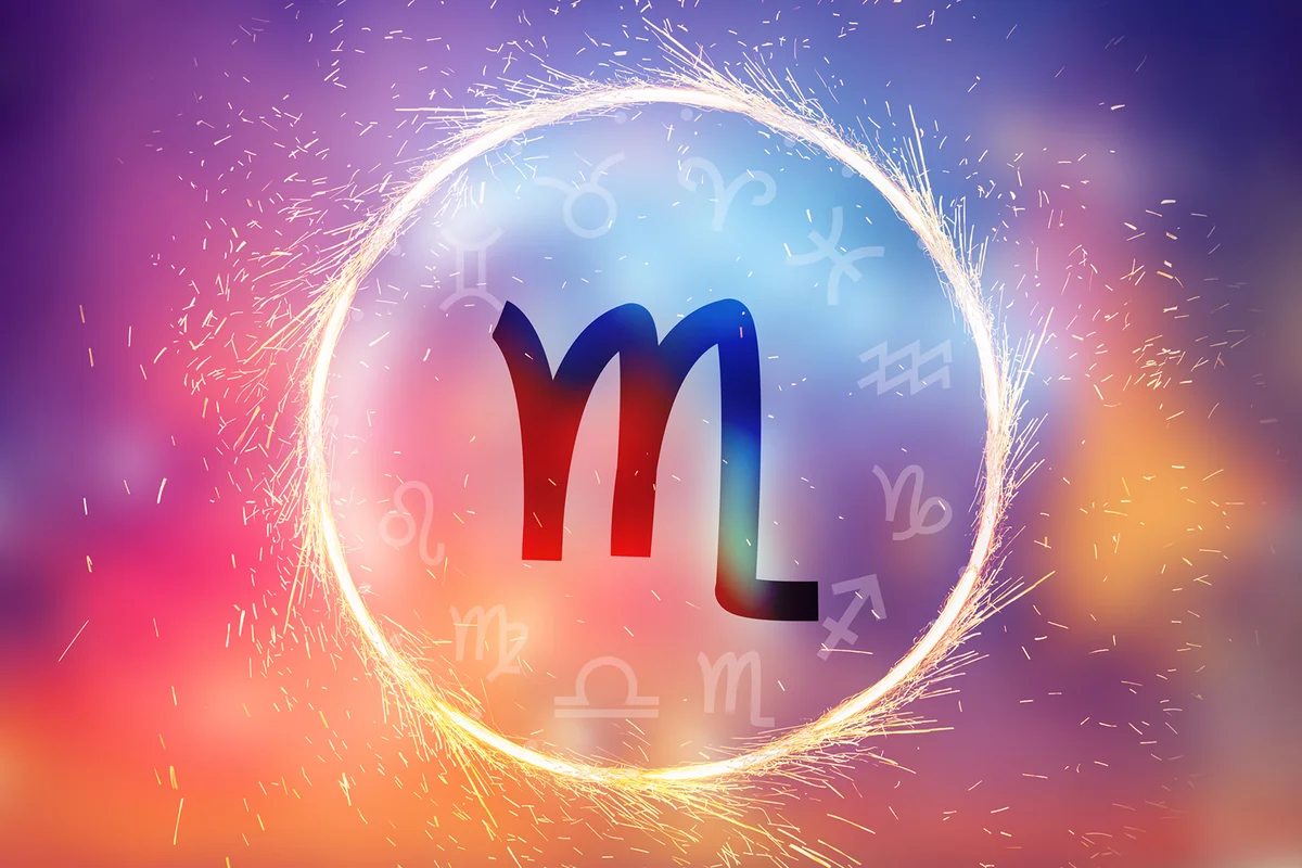 Scorpio symbol on a colorful background light
