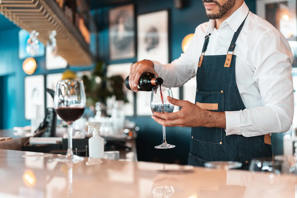 pouring red wine