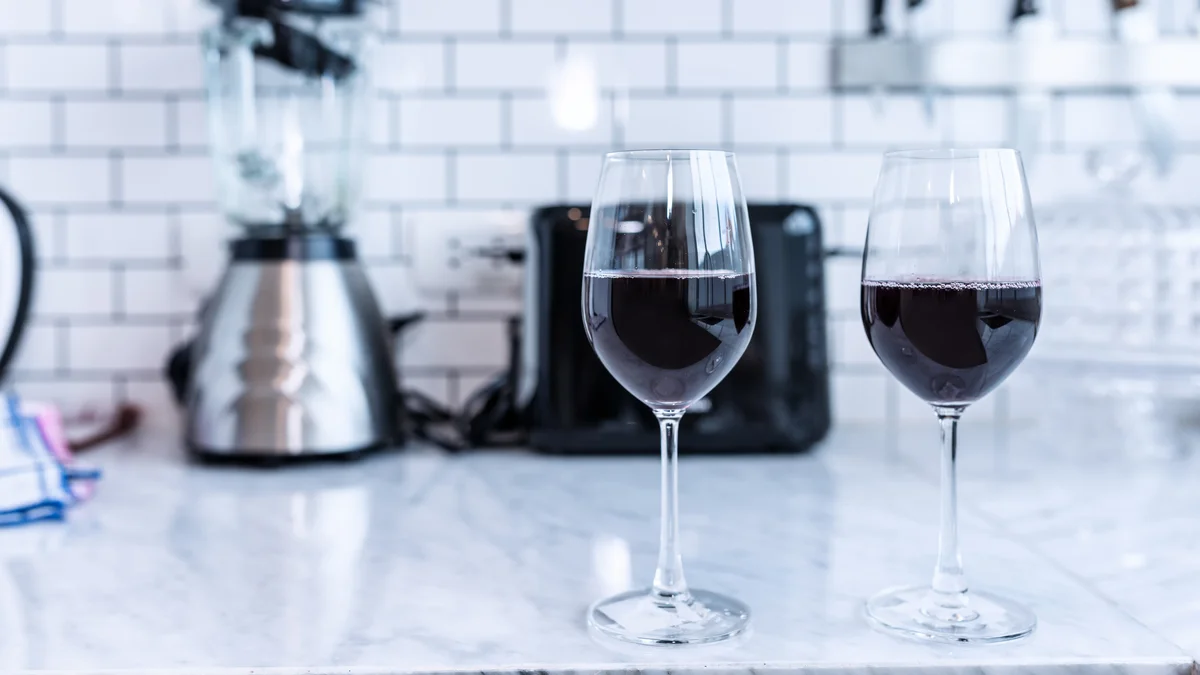 two glasses of grenache on kitchen counter