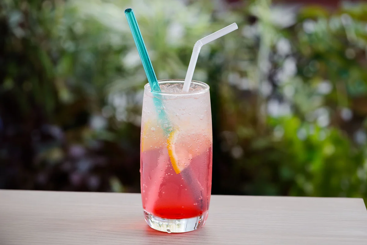 Pink drinks and lemon garnish