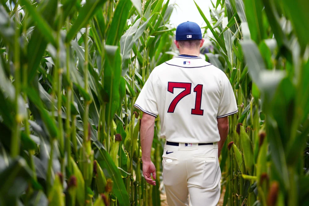 Keegan Thompson #71 of the Chicago Cubs walks through the corn