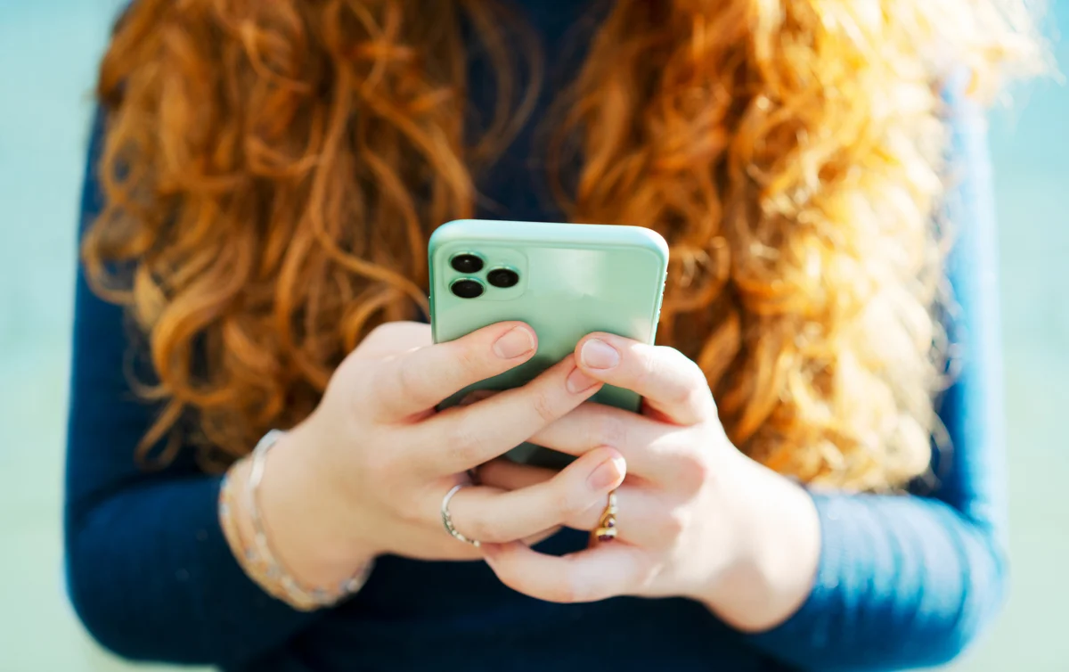 Woman using smart phone
