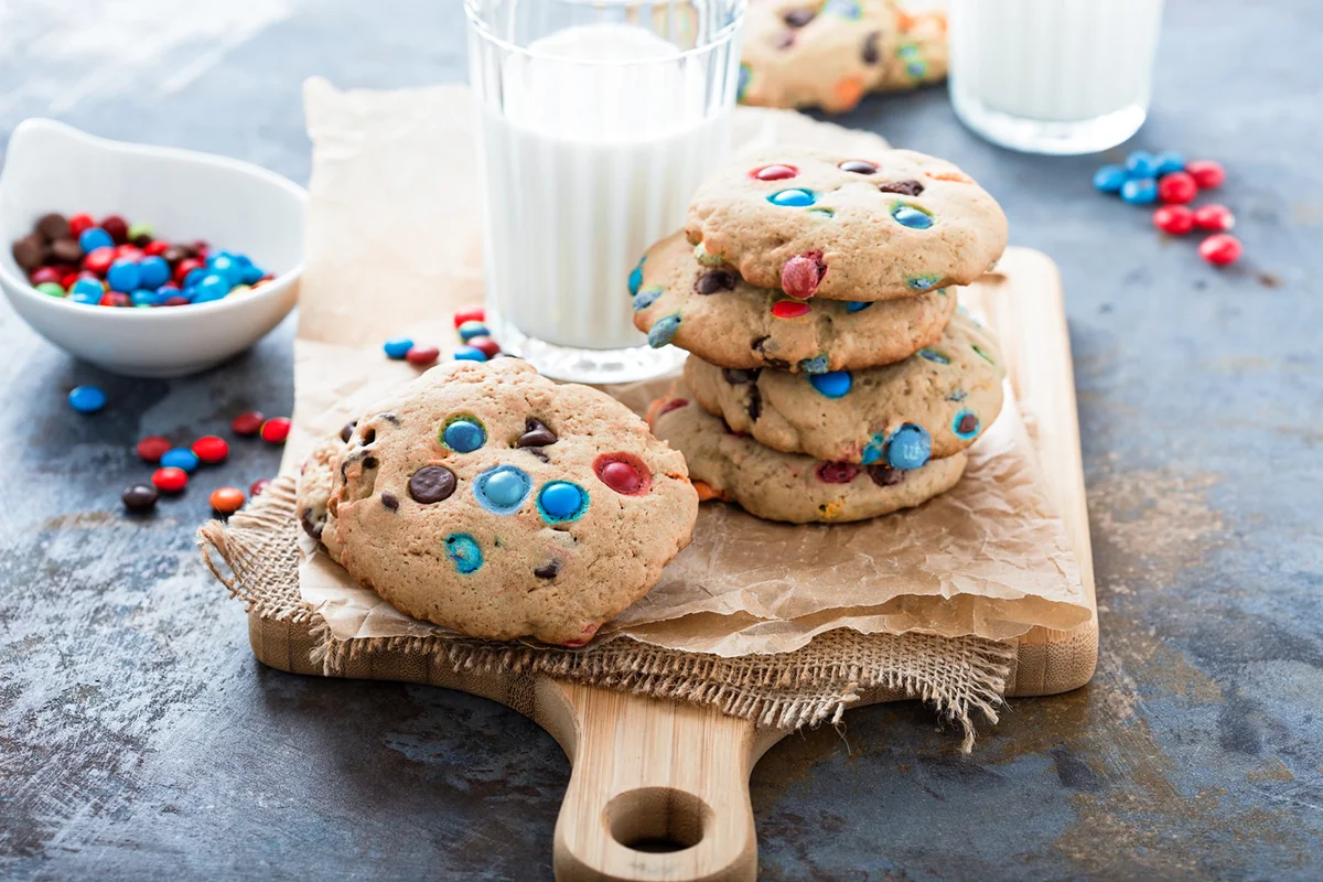 Chocolate chip and candy cookies with milk