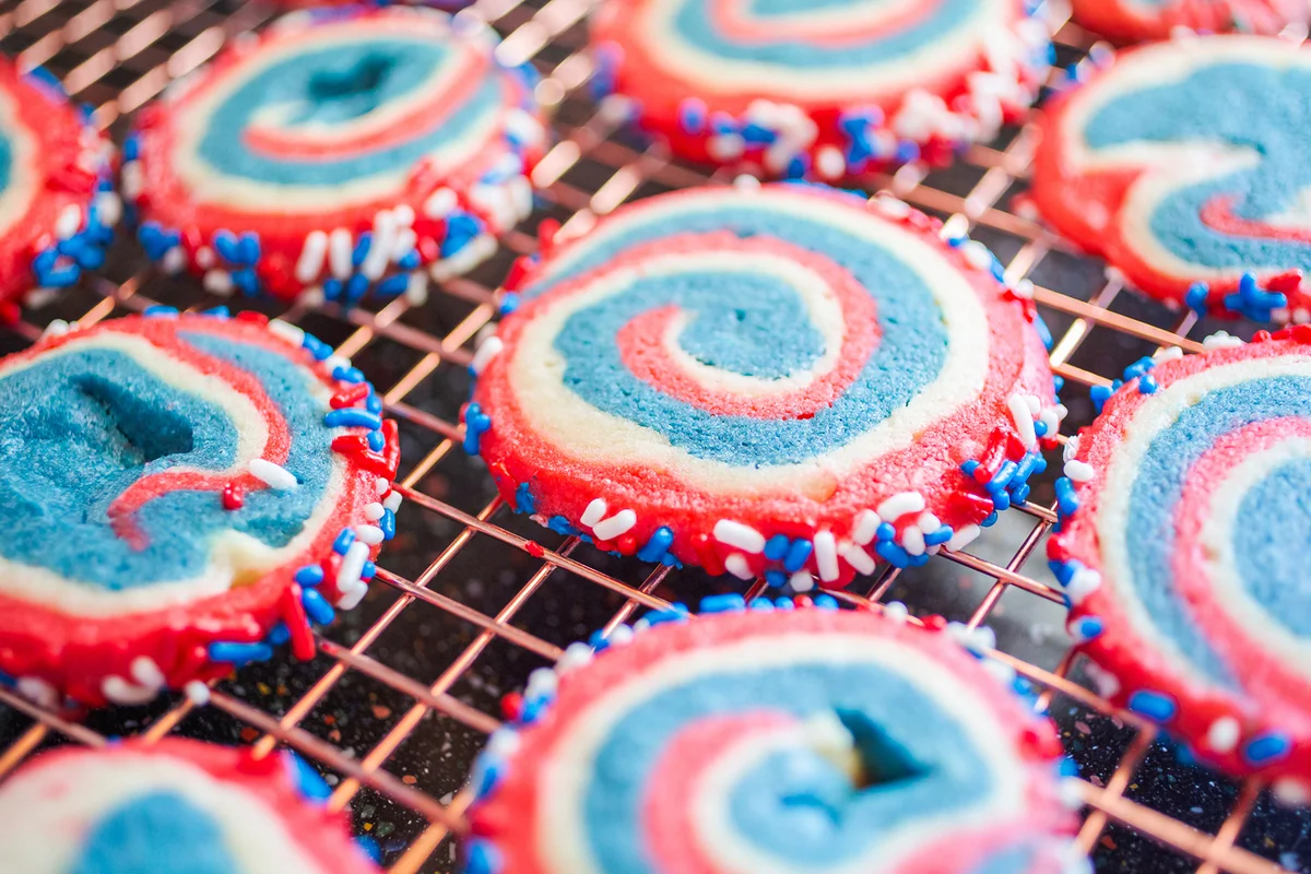 Red white and blue pinwheel sugar cookies for July 4th celebration