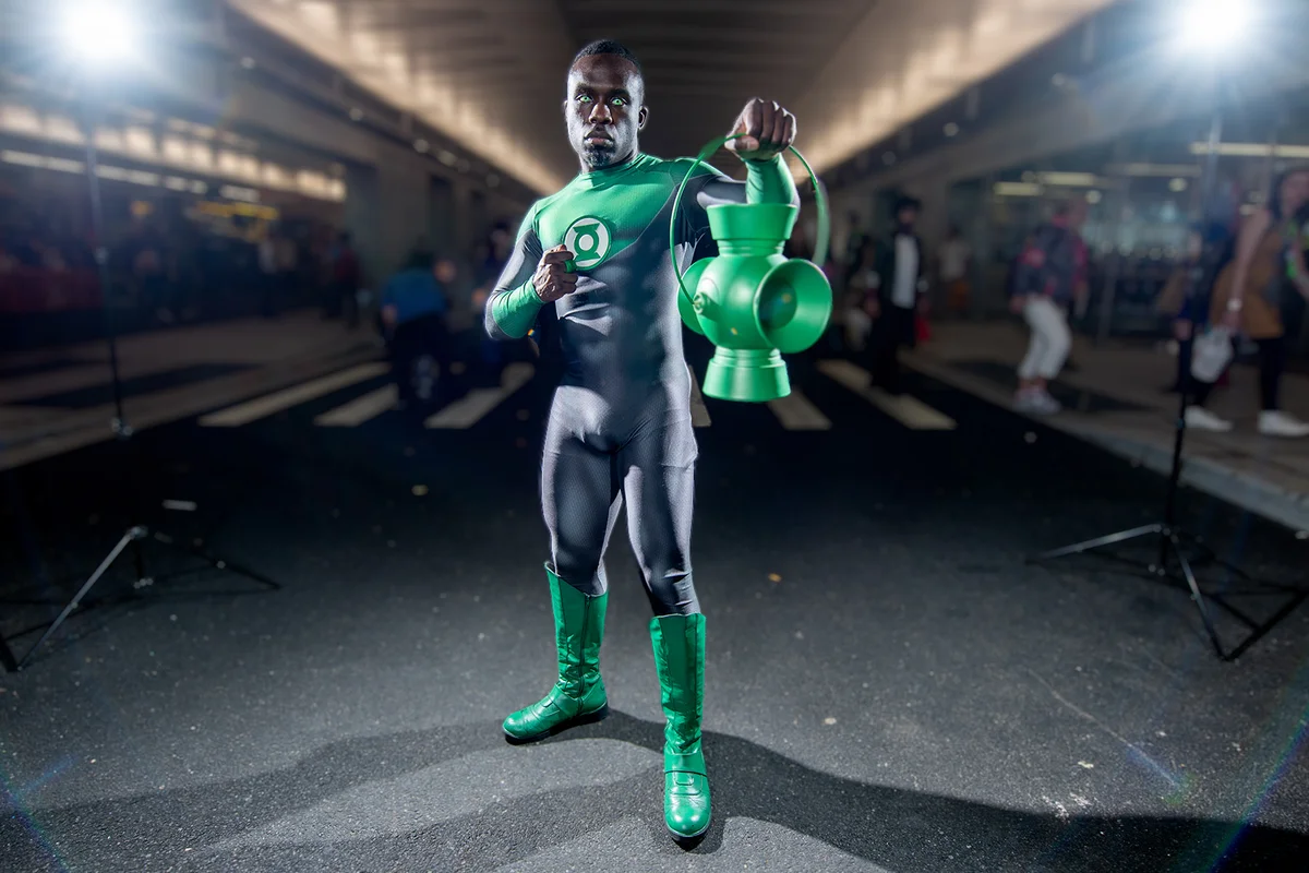 A fan cosplays as Green Lantern form the DC