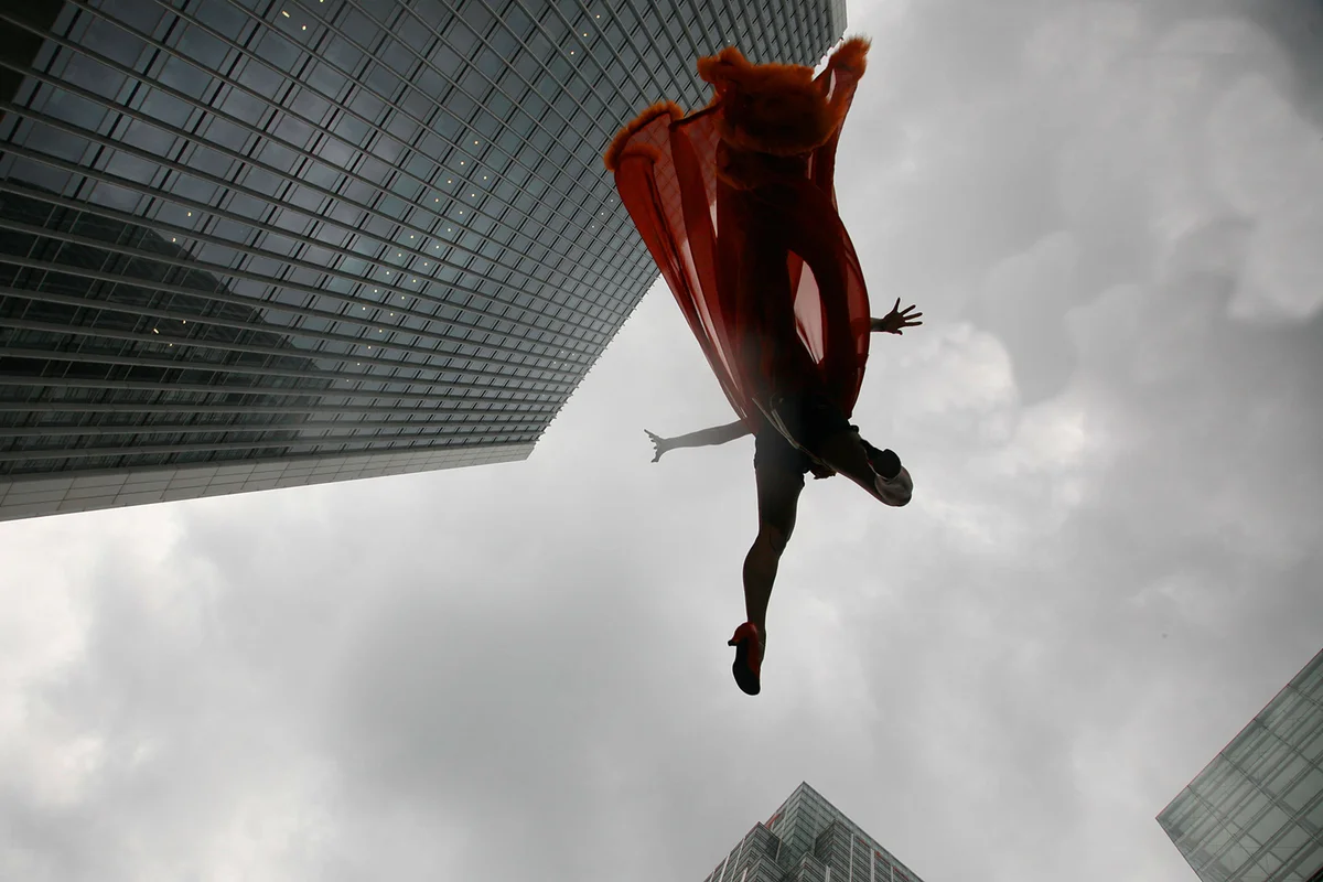 Superhero jumping between buildings