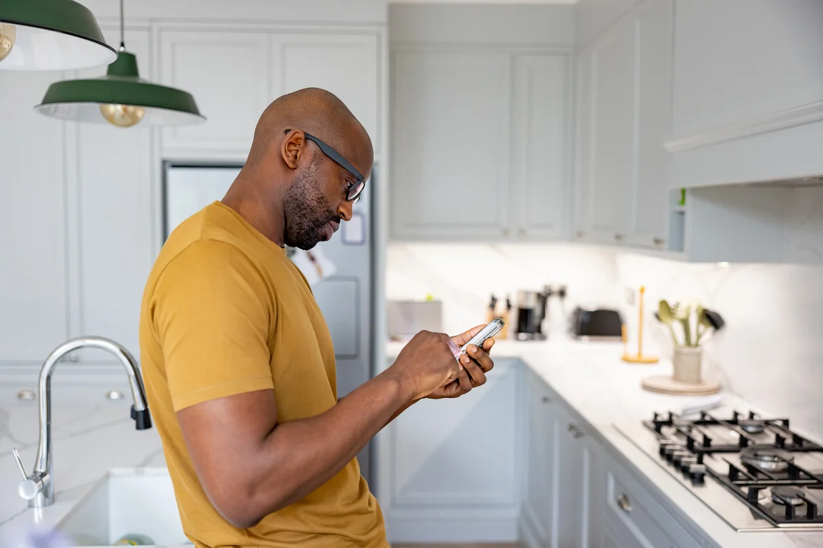 Man looking up resources on phone