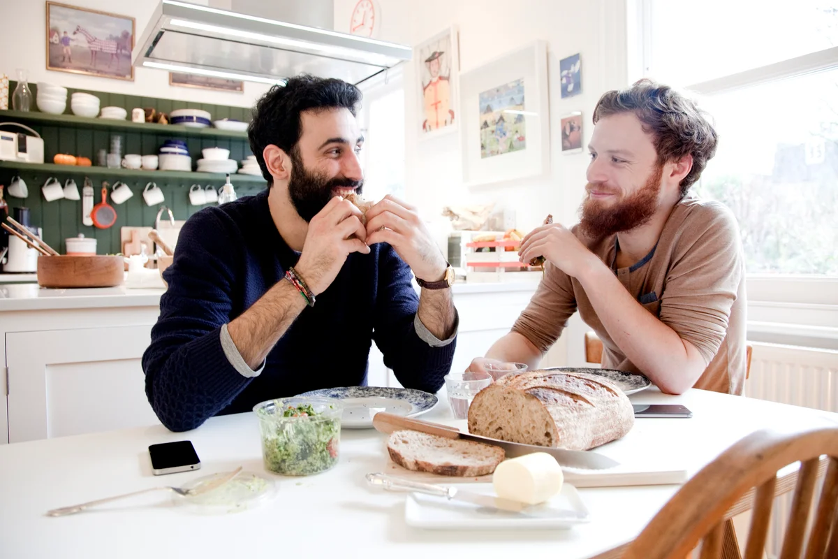 couple talking and eating