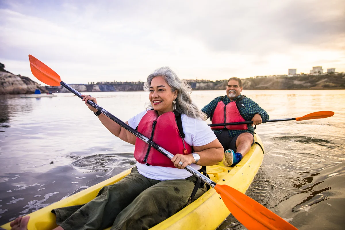 senior couple kayaking