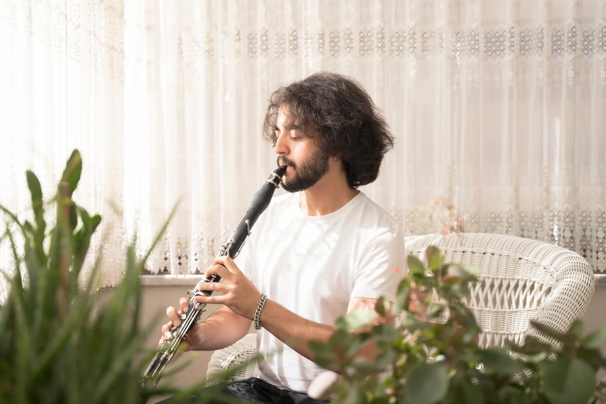 Young man playing the clarinet