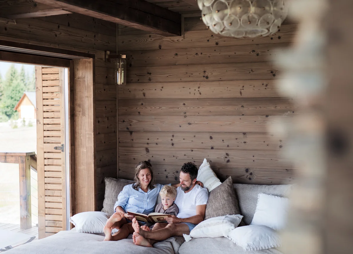 Family relaxing in room on vacation