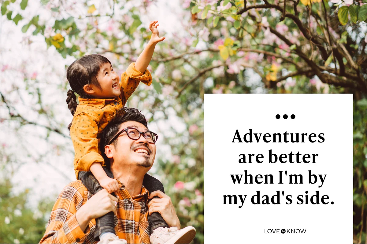 Little daughter riding young dad's shoulder