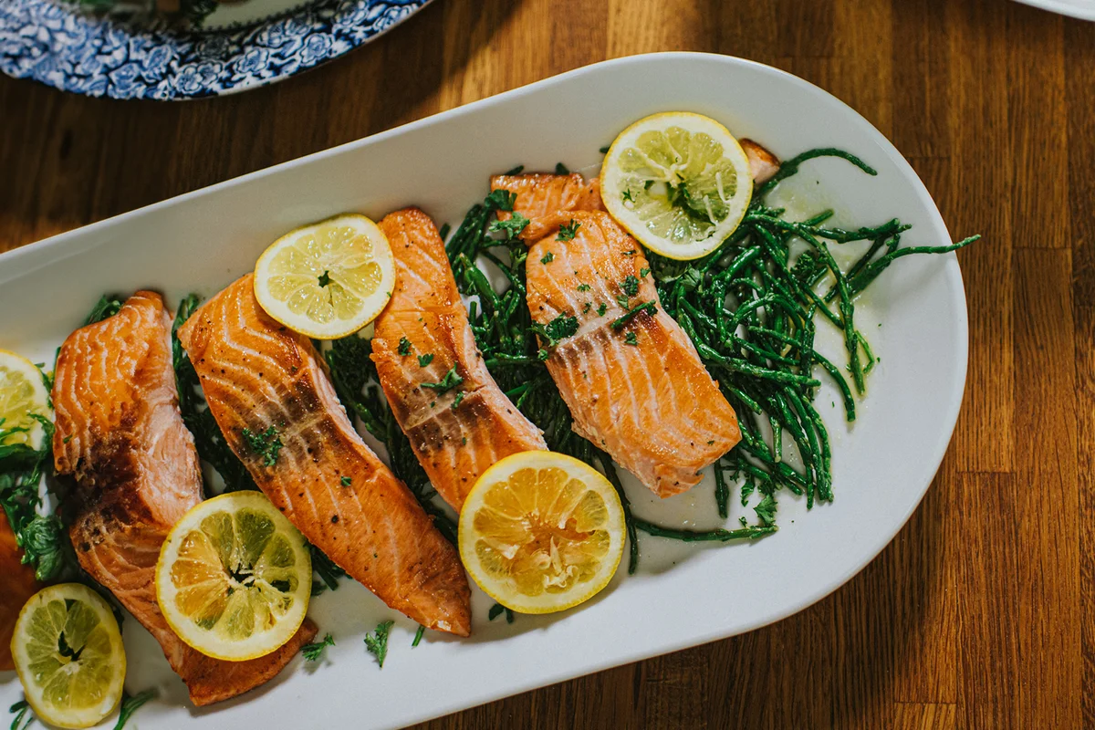 Salmon on a serving plate on a table