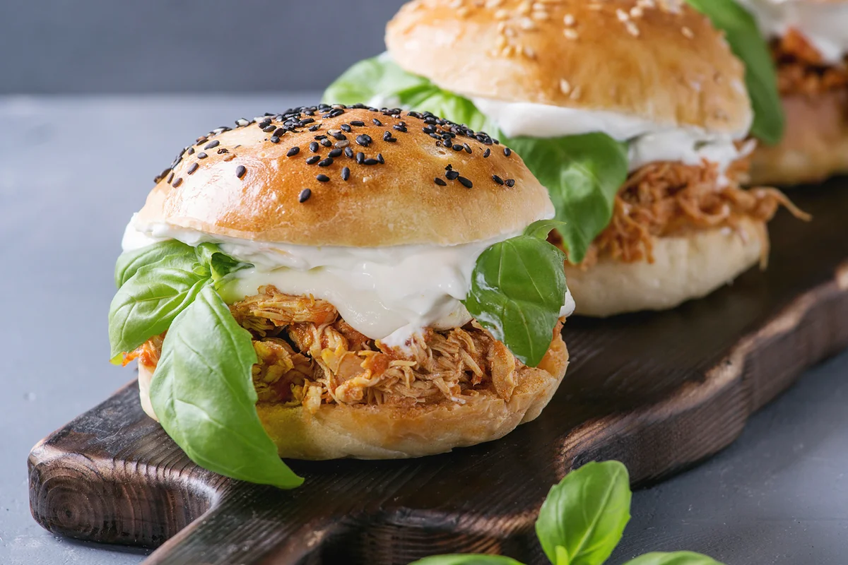 Homemade mini burgers with pulled chicken