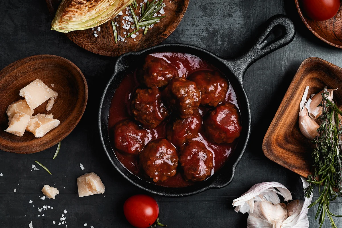 Homemade meatballs in cast iron pan