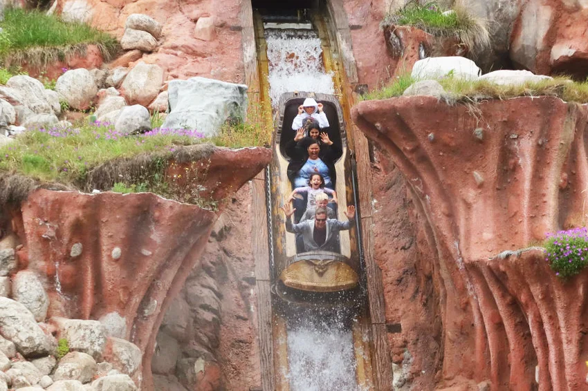 People ride the Splash Mountain attraction at the Disneyland