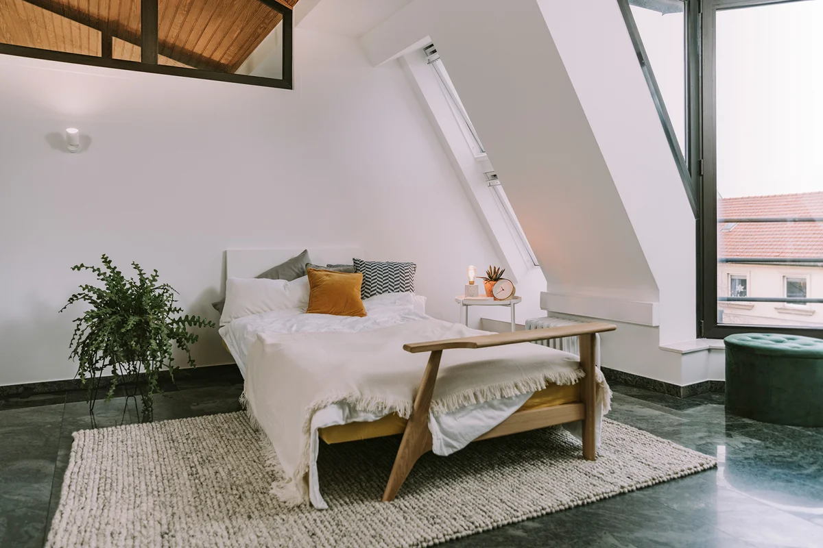Interior of bedroom in loft apartment