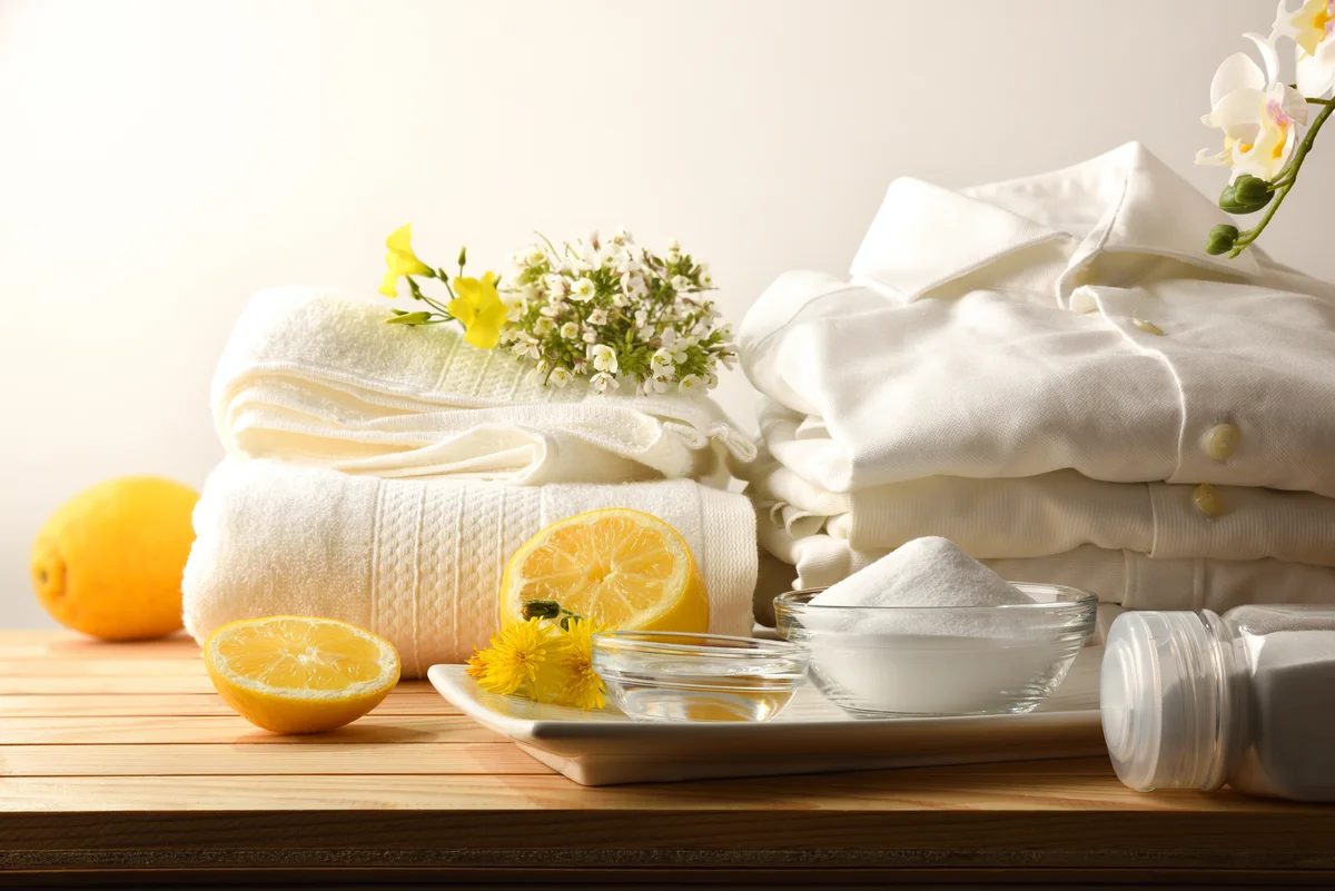lemon and baking soda with clean laundry