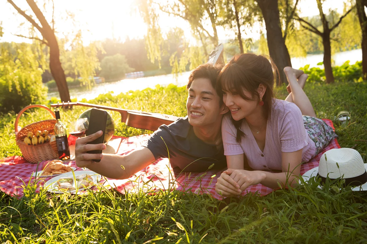 Lying on the grass pictures of happy couple