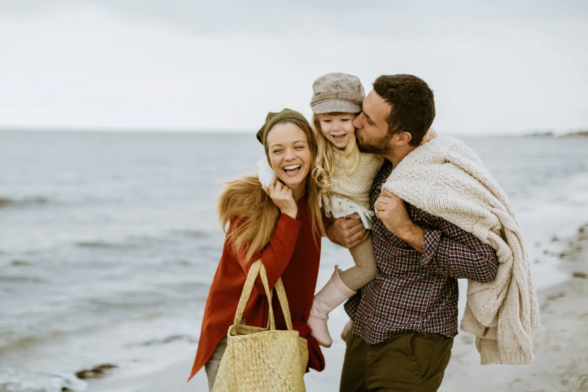 Young family on the beach