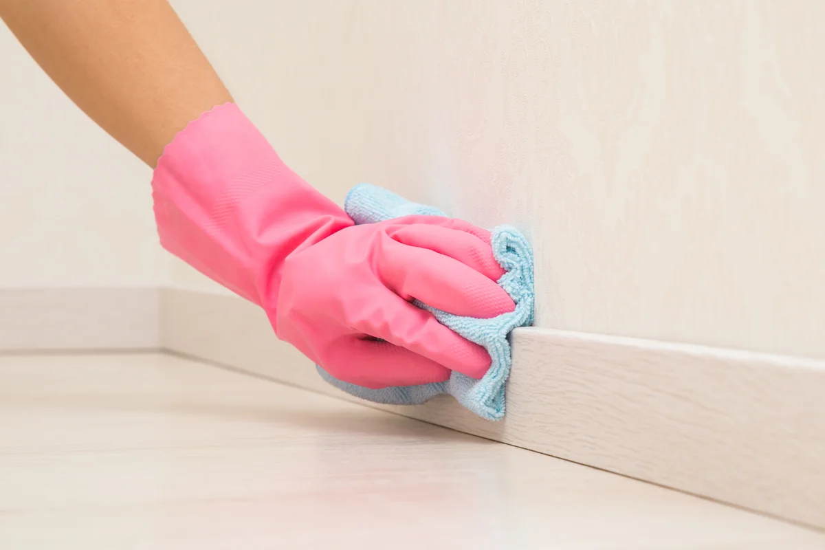 cleaning baseboards