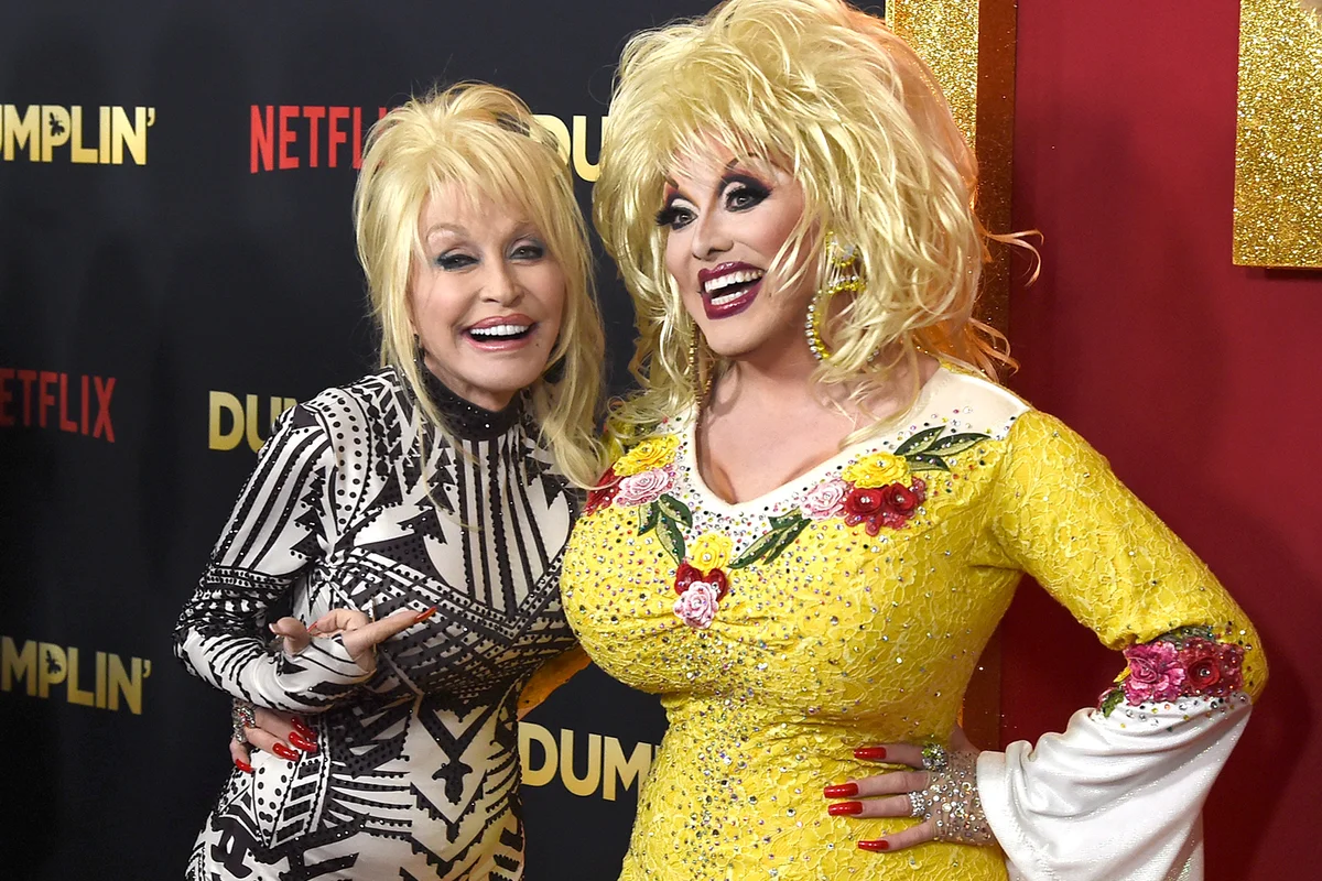 Dolly Parton and her impersonator Jason CoZmo