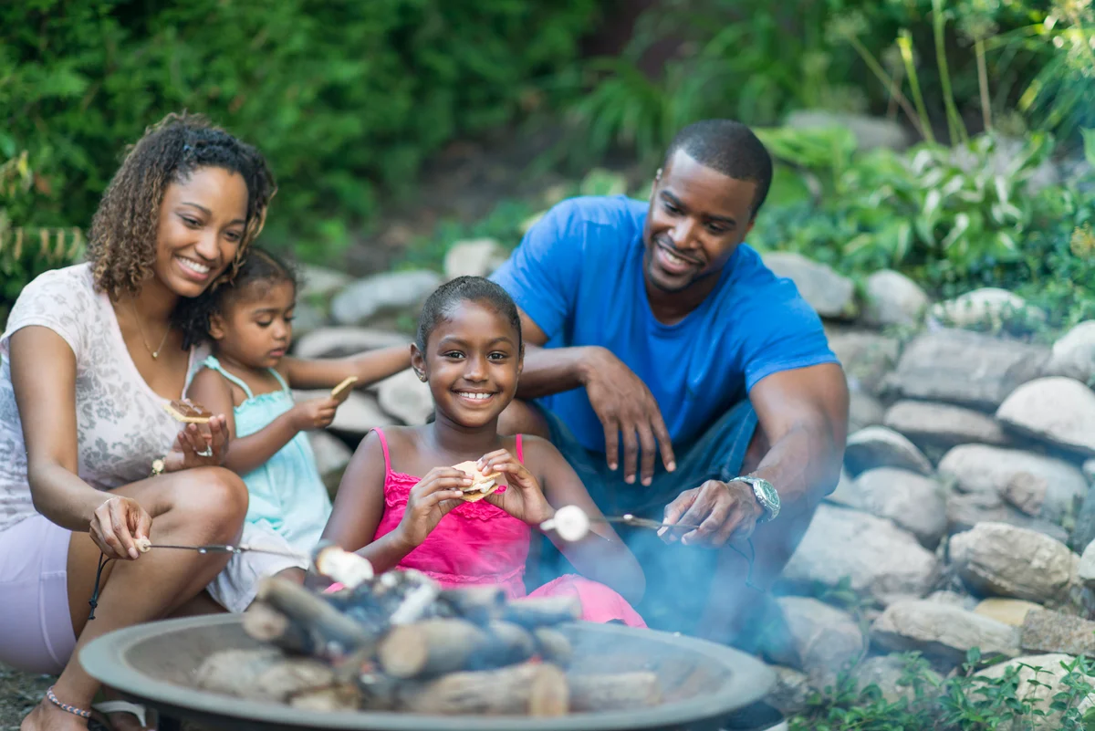 family eating smores
