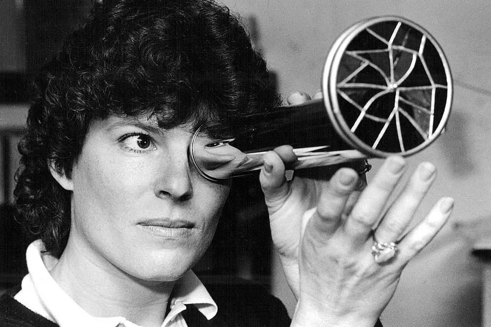 Woman using a kaleidoscope