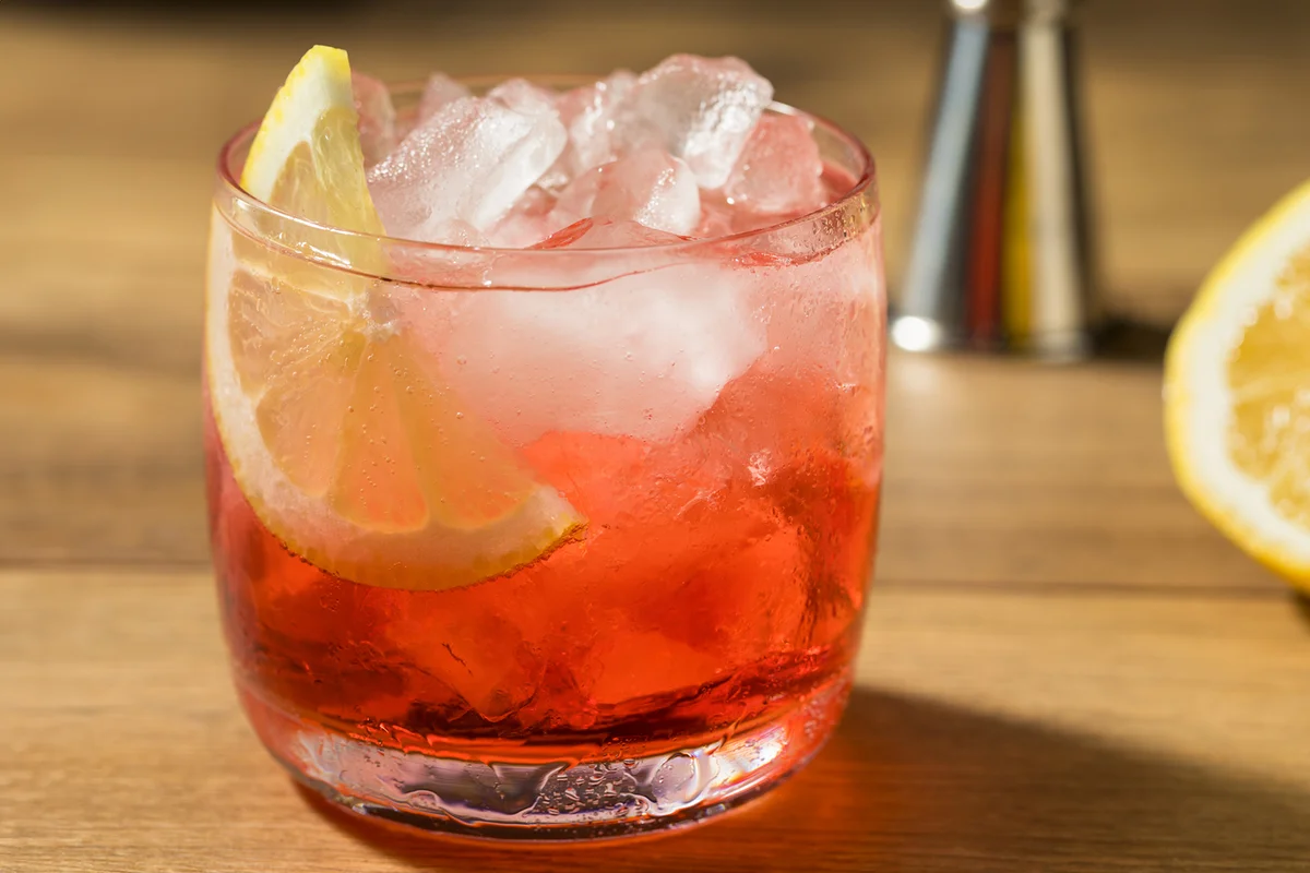 Campari Spritz Cocktail with a Lemon Garnish