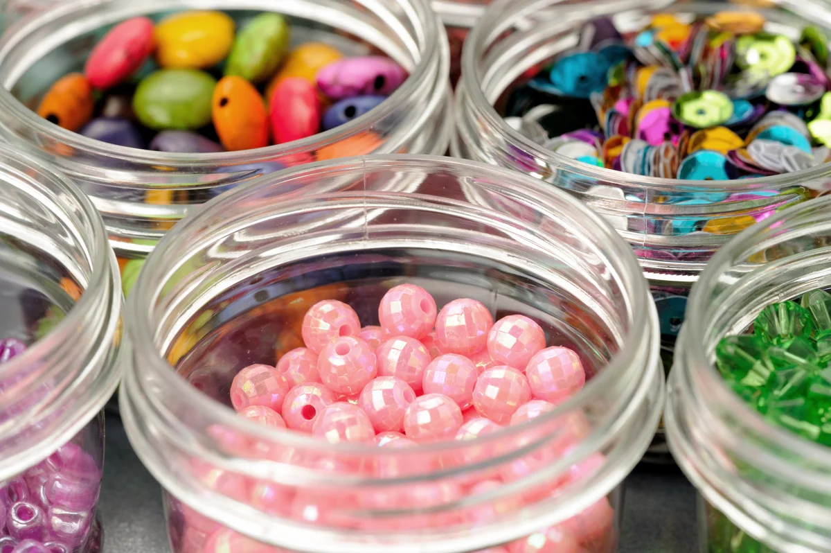 Colorful beads in Mason jars