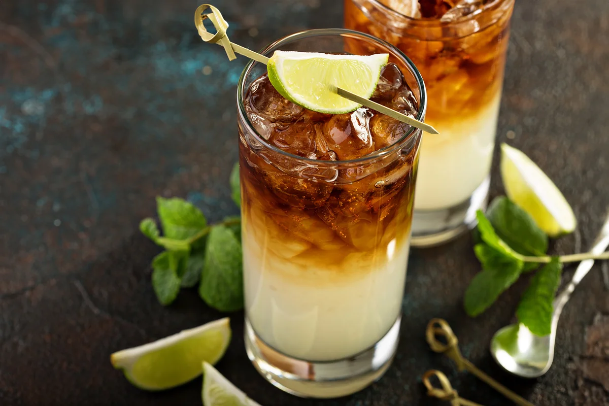 Dark and stormy cocktail with ginger ale and rum