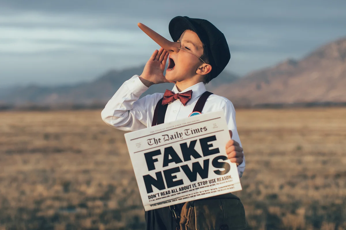 Old Fashioned Pinocchio News Boy Holding Fake Newspaper