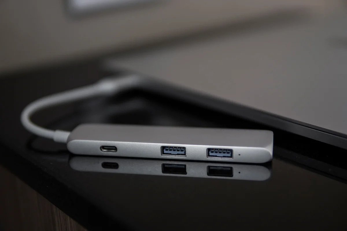 Multiport station for laptop with multiple different ports