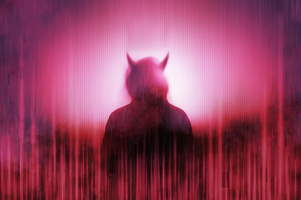 Silhouette of a mysterious horned devil figure without a face