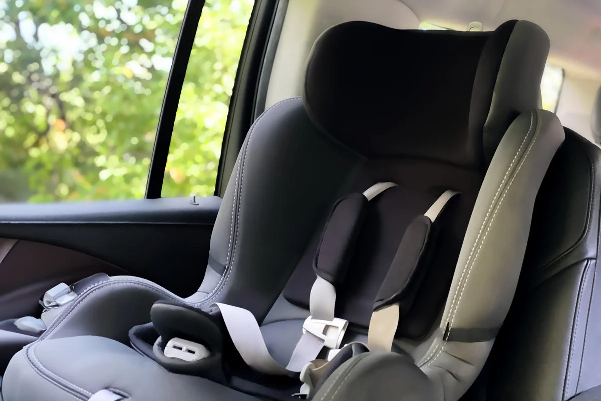 standard child car safety seat installed in vehicle