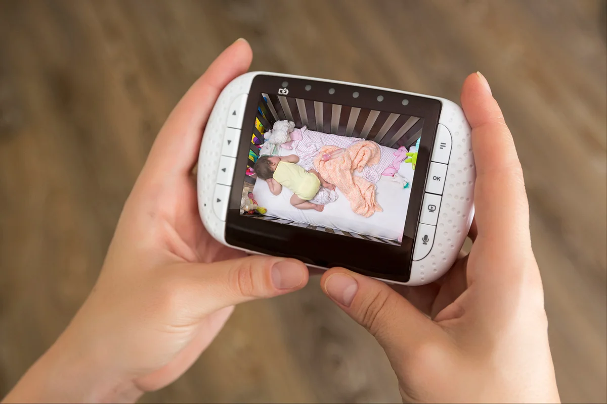 Person watching baby monitor