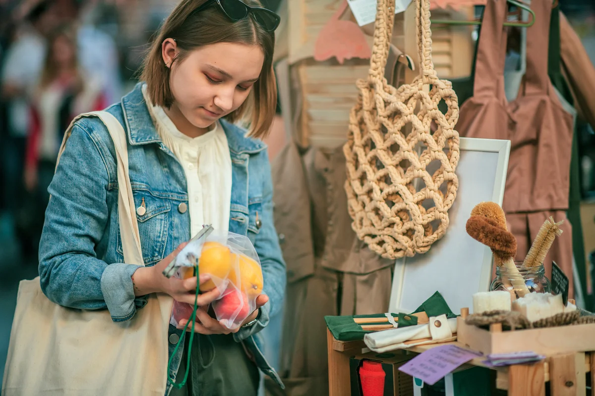 Woman shopping at a market in summer
