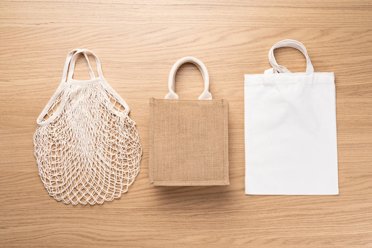 Reusable Shopping Bag Options on Wood Table