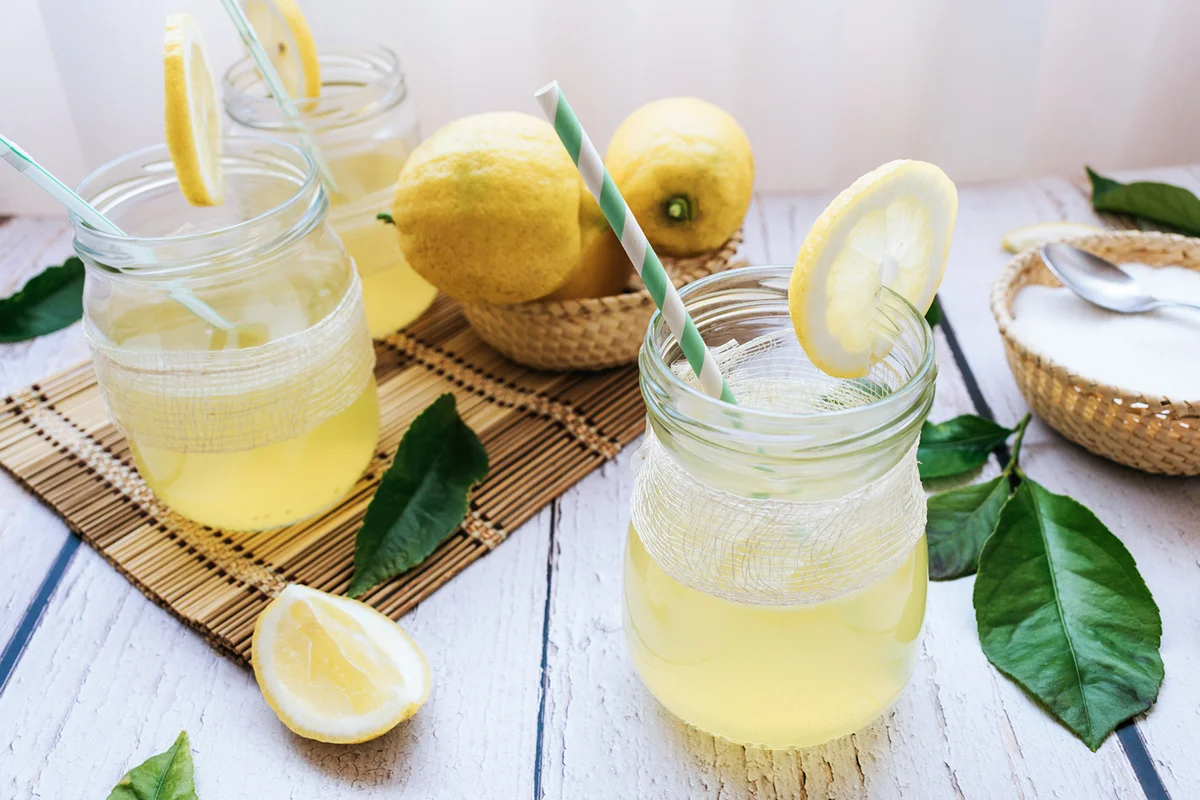 Three glasses of homemade lemonade on a table