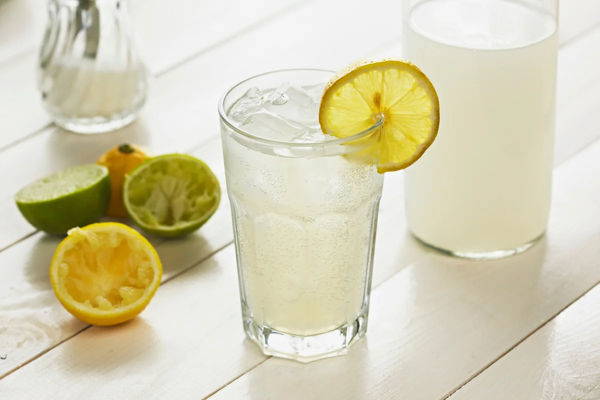 Glass of homemade lemonade with slice of lemon