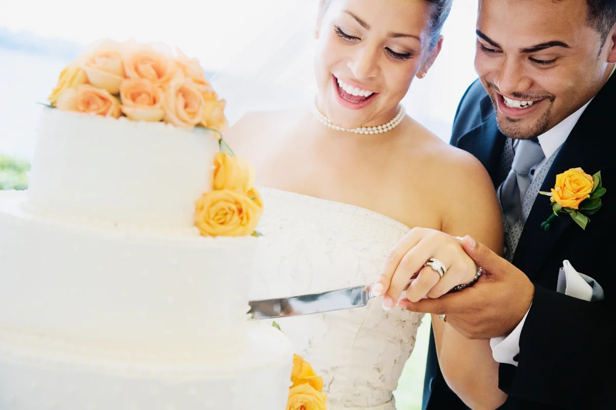 Couple cutting a cake